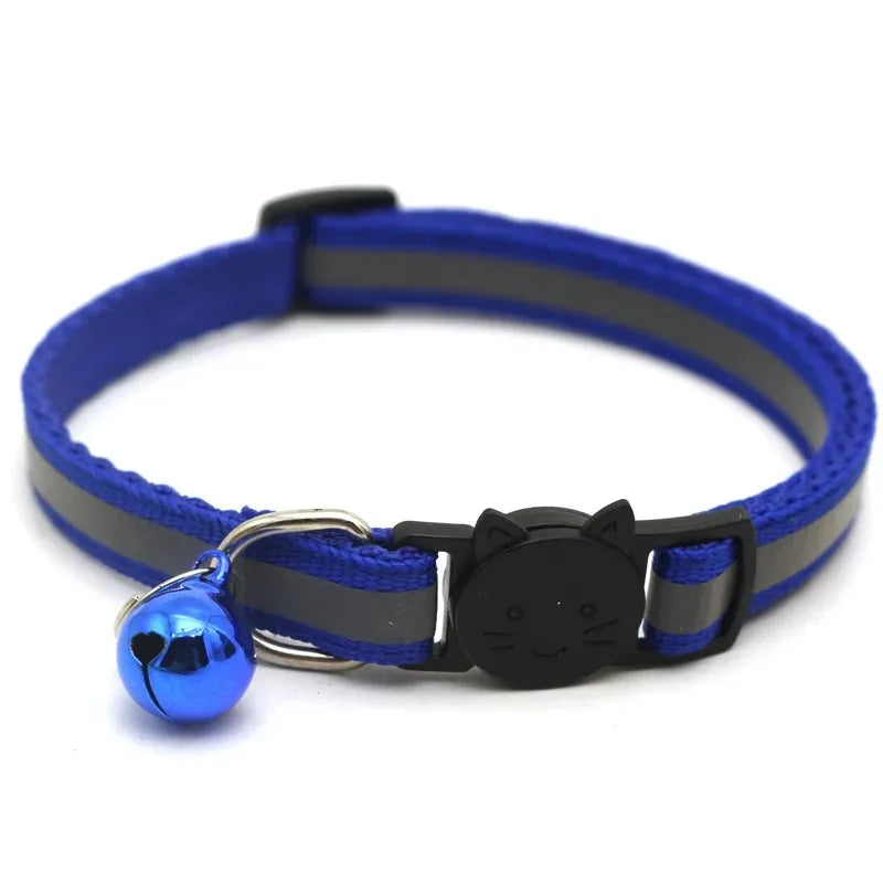 Blue cat collar with bell, black paw buckle and metal D-ring on adjustable strap
