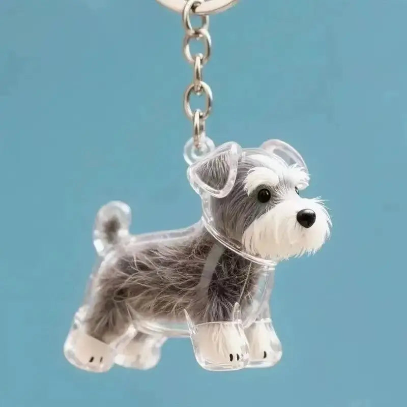 Transparent pet memorial keychain capsule with chain, clear terrier dog figure with gray ears