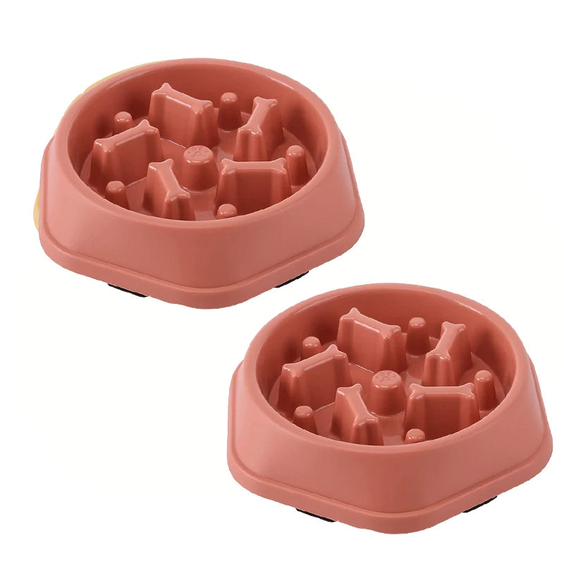 Pink slow feeder dog bowl with raised maze-like insert