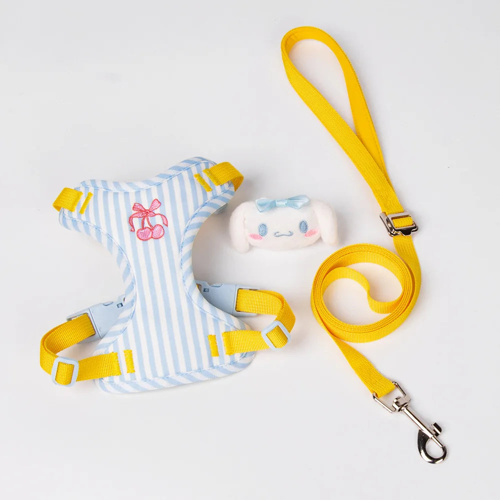 Blue and white striped dog harness with yellow leash and plush toy