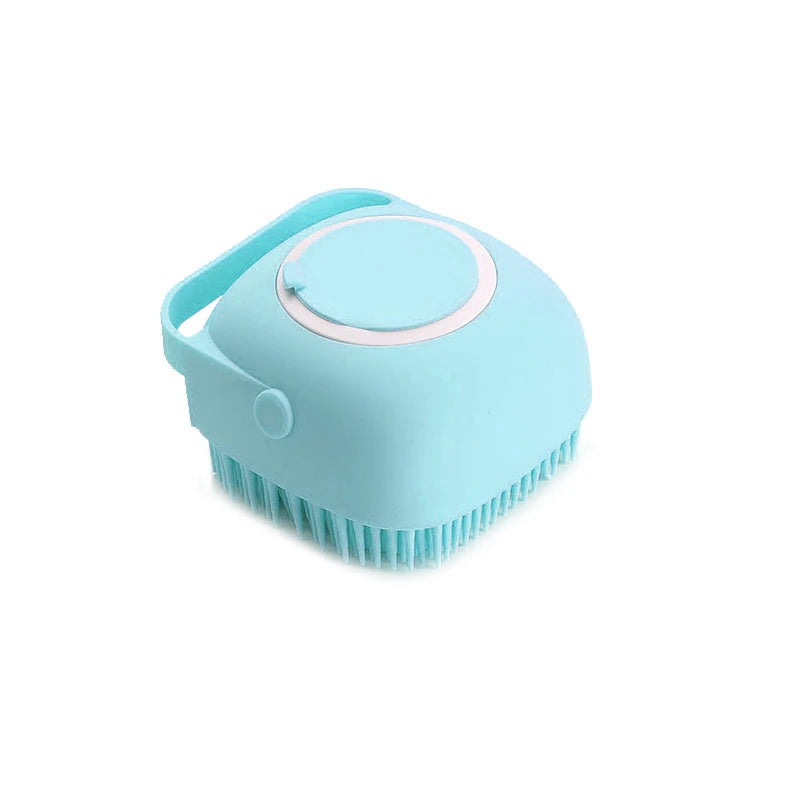 Light blue pet bathing brush with soft silicone massage bristles and round lid