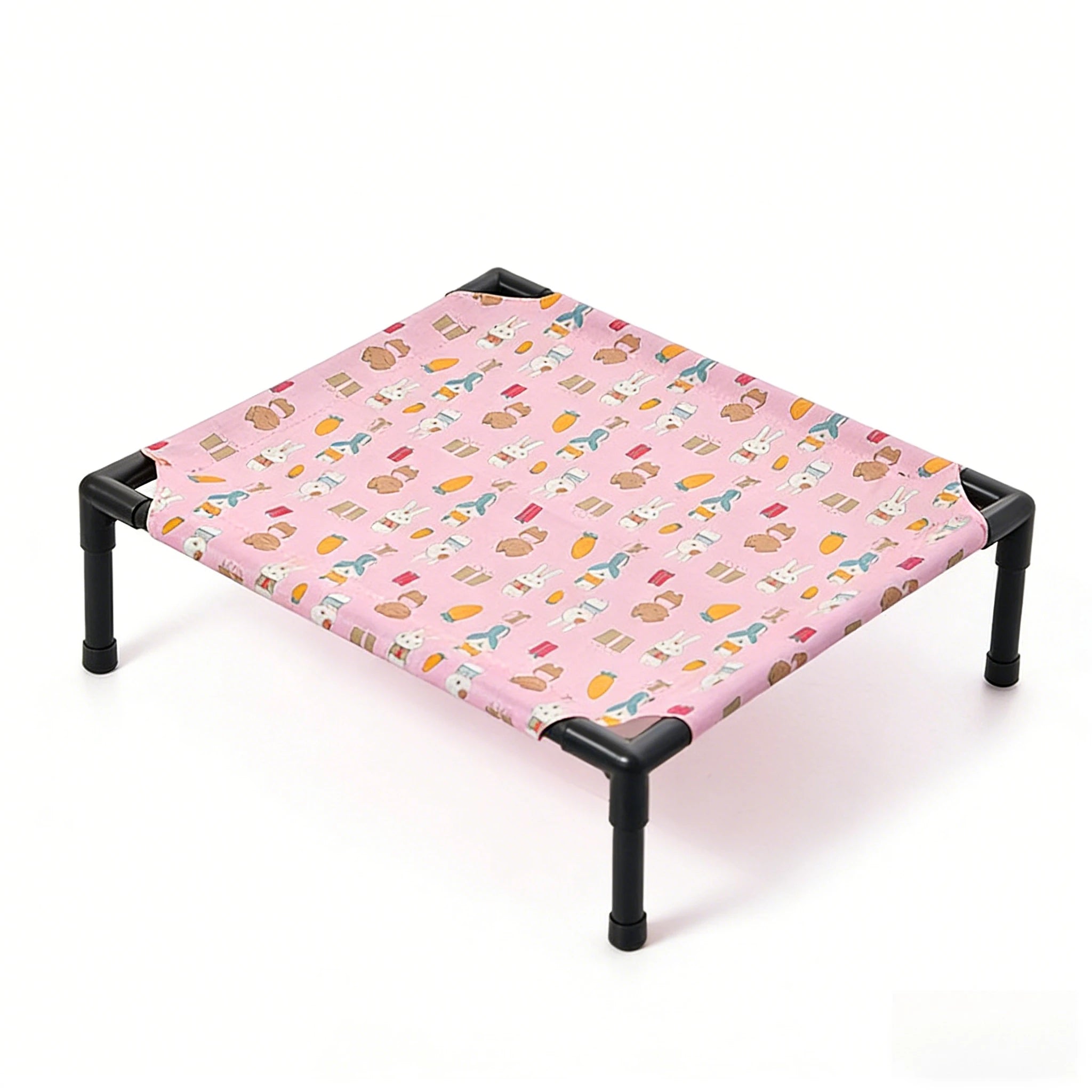 Outdoor elevated dog cot with pink animal-print fabric cover and black metal legs