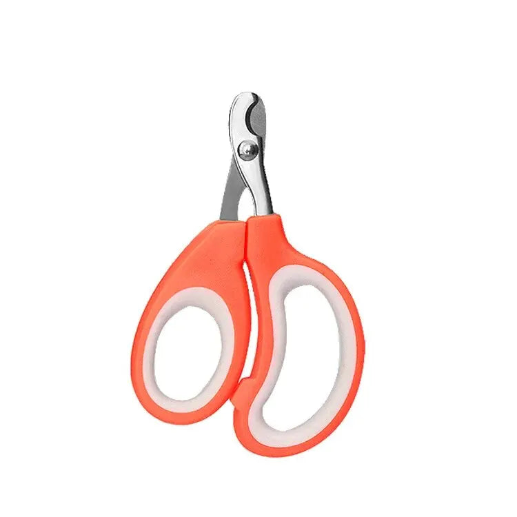 Orange crescent-shaped dog nail clipper with white inner rings and steel blades