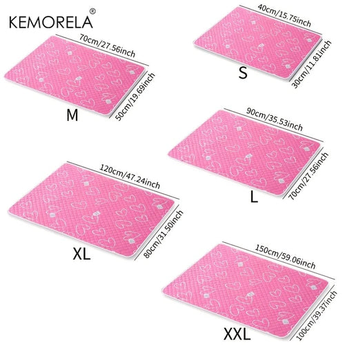 Two-piece pet training mat set, pink quilted pads with heart and paw pattern in multiple sizes.