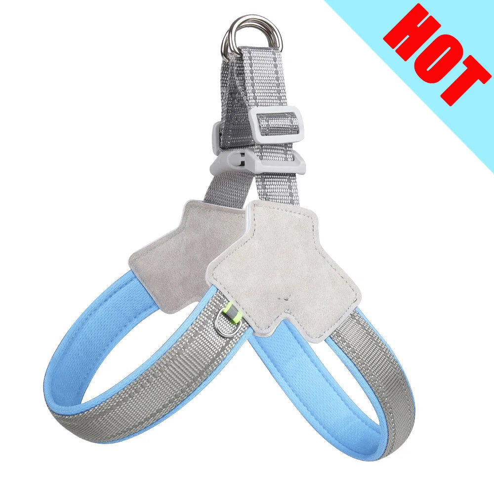 Blue no-pull padded dog harness with gray suede chest pad and reflective gray straps