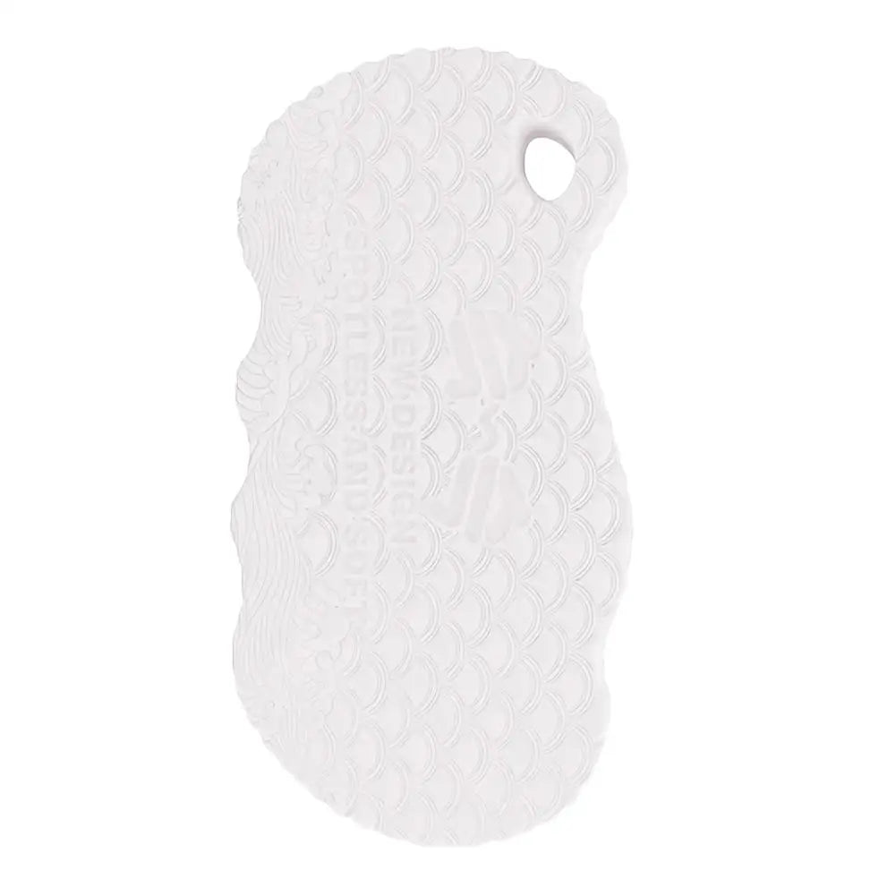 White exfoliating bath sponge with embossed scale pattern and hanging hole