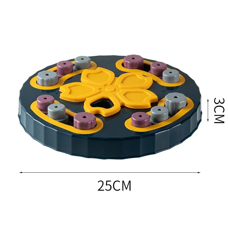 Round cat scratching lounge toy with yellow paw center and gray/purple/peach pegs