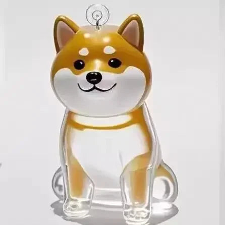 Orange and white resin cat keychain charm with a gold cord loop