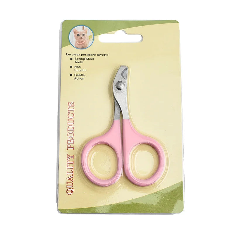 Pet nail grooming scissors with pink handle and silver blades in retail blister pack