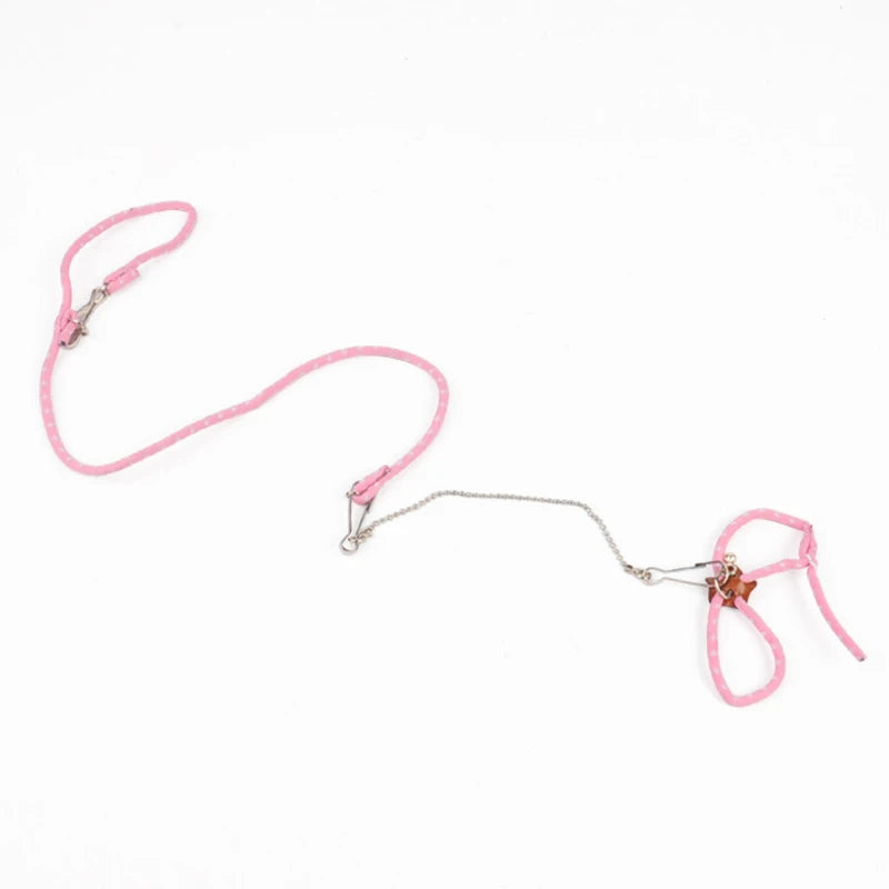 Pink pet harness leash set with adjustable strap loops and metal chain clips