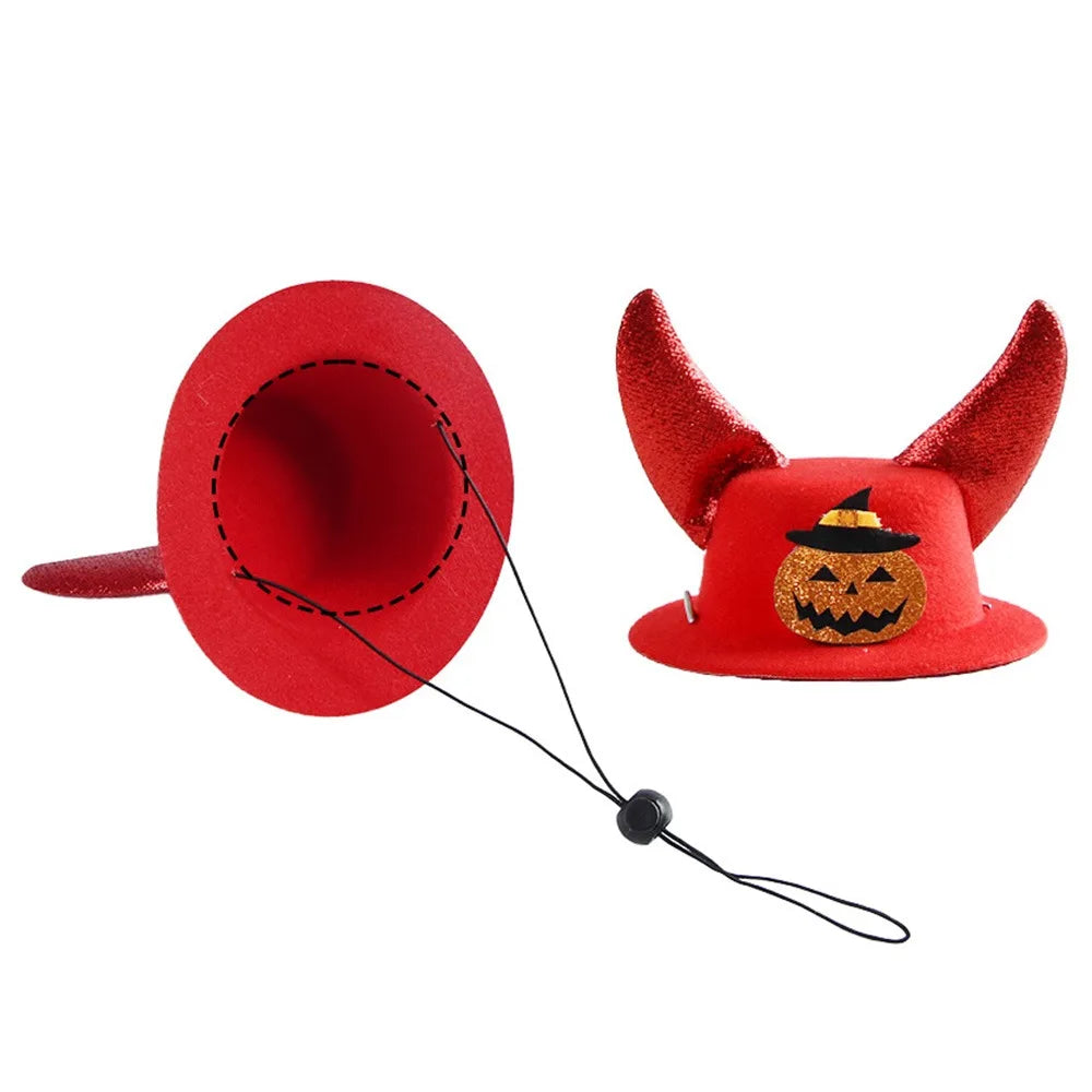 Red pumpkin-themed pet cosplay hat with horns and adjustable chin strap.