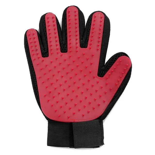 Red silicone pet grooming glove with raised nubs and black fabric wrist strap