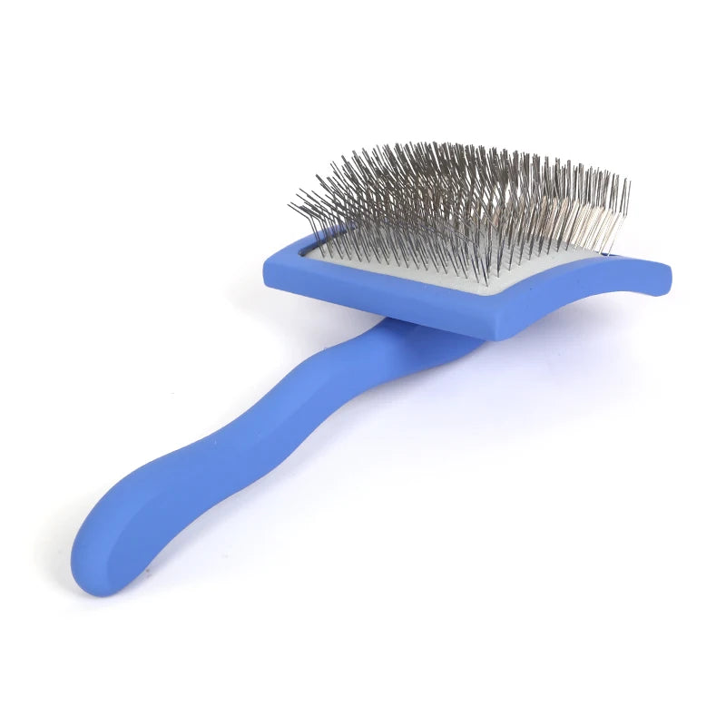 Pet grooming hair remover brush with blue handle and metal pins