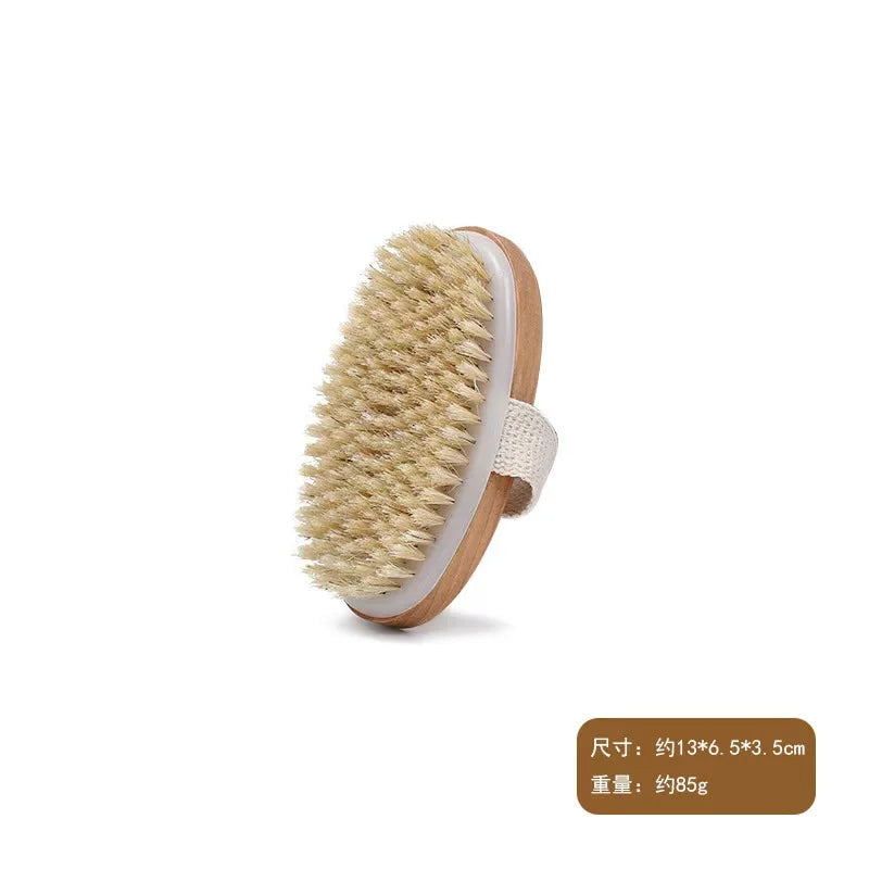 Round bath scrub brush head with beige bristles, wooden backing, and white strap.