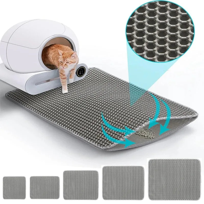 Gray waterproof cat litter mat with raised honeycomb holes and non-slip backing