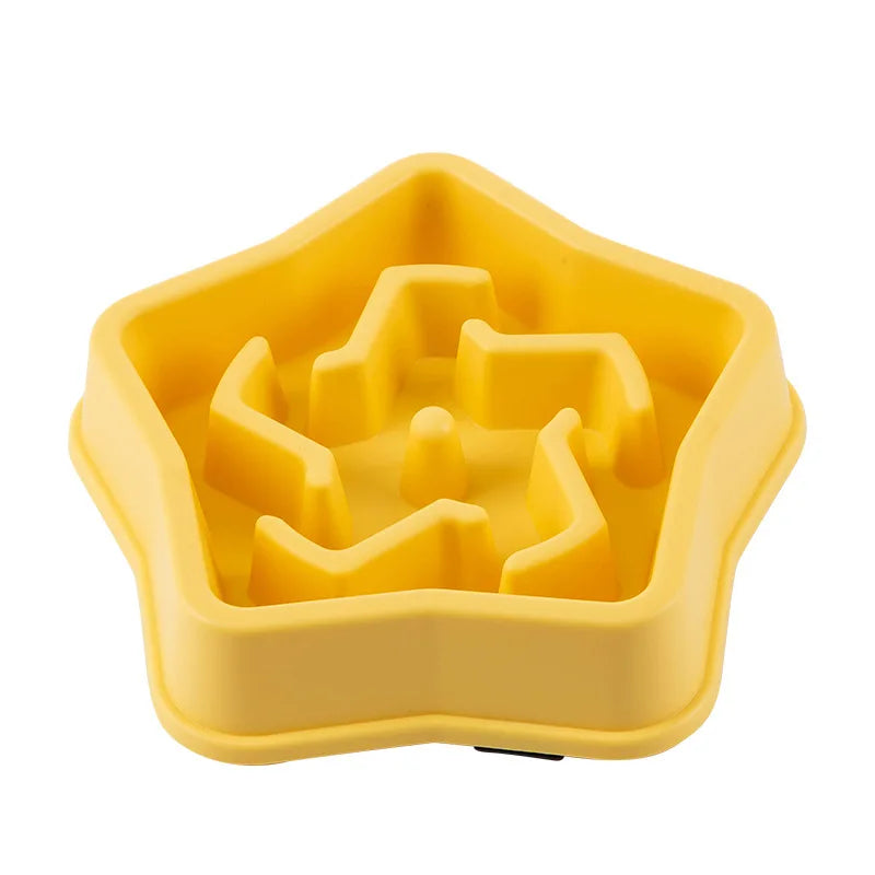 Yellow slow feeder pet bowl with inner maze dividers and raised bite blocks