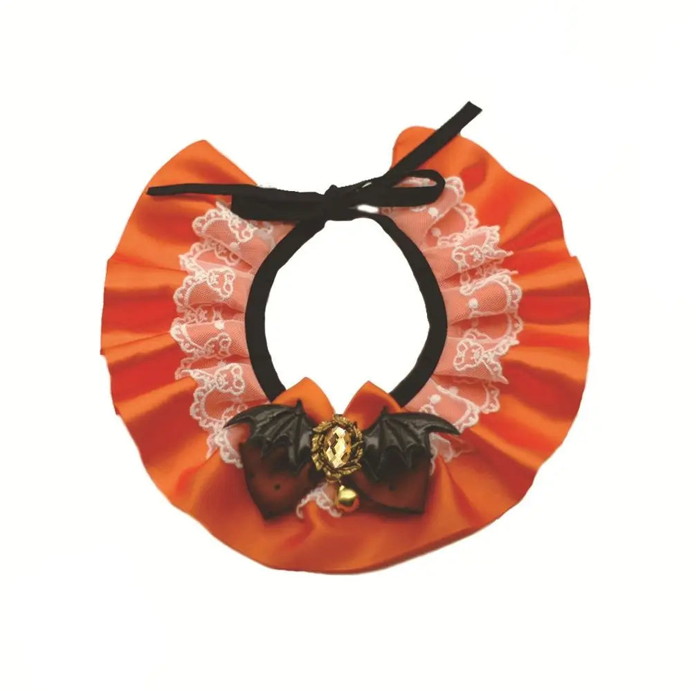 Orange Halloween pet lace collar bib scarf with white lace edging, black bow, and gold pendant