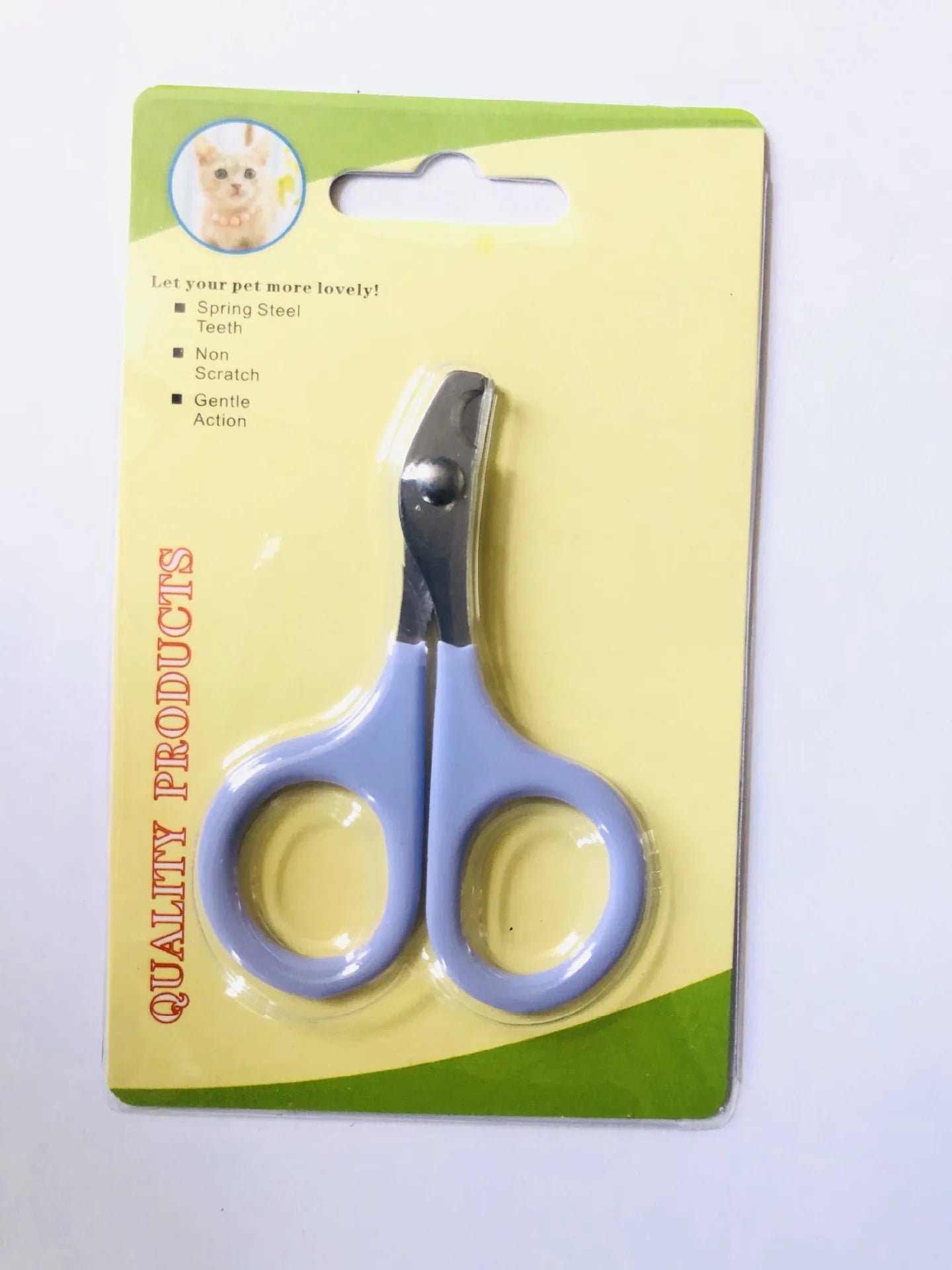 Pet nail grooming scissors with blue handle and silver blades in retail blister pack